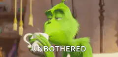 The Grinch sipping tea unbothered