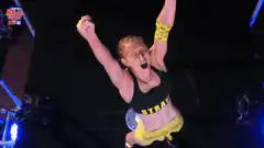Carmella celebrating in the ring