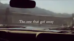 Car flips over with text