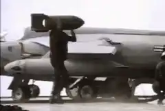 Airman carries bomb on head