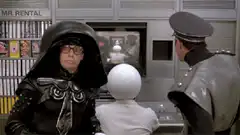 Mr. Rental and Mr. Rental employee watching TV