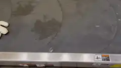 Stuffed Buzz Lightyear on conveyor belt