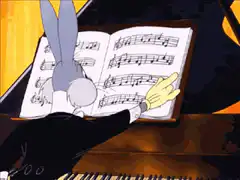 Bugs Bunny plays piano and sees pin-up