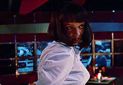 Mia Wallace turns and looks back