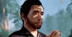 Sakichi praying and looking down