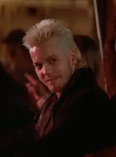 Tyler Durden smirking and looking around