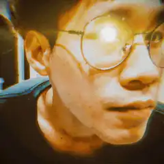 Close up of a man with glasses