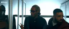 Drake and Anderson .Paak looking at server rack