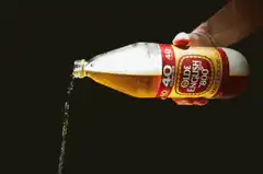 Olde English 800 beer pouring