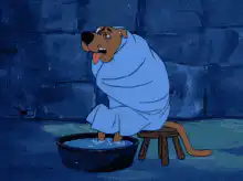 Scooby-Doo soaking feet in tub