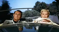Cary Grant and Grace Kelly in a car