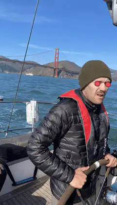 man on boat with laser eyes