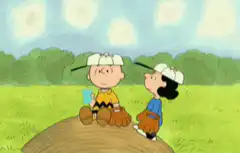 Charlie Brown and Lucy playing baseball