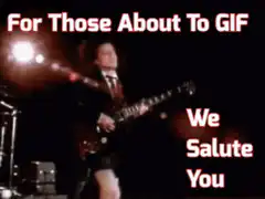 AC/DC guitarist playing guitar on stage