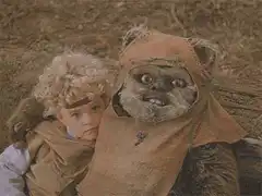 Ewok and child in forest