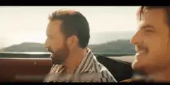 Nicolas Cage and Pedro Pascal in a car