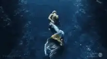 Mermaid swimming underwater