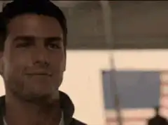 Tom Cruise puts on sunglasses