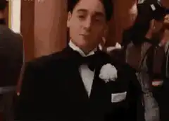 Tom Hanks in Philadelphia adjusting his glove