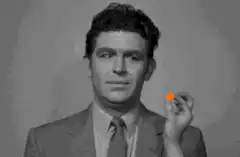 Man Swallows Orange Ball