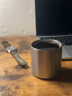 coffee cup on wooden desk