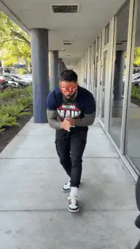 Man in red glasses does yeet dance