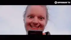Girl with wide eyes smiling
