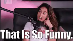 Woman laughing sarcastically into microphone