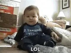 Baby falls over laughing LOL