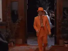 Man in orange suit falls down