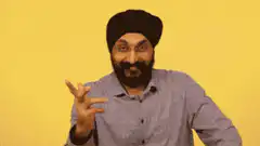 Man in turban making hand gesture