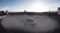 red car drifting on track