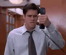 Jim Carrey screaming into a phone