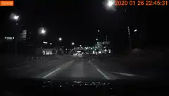 Night drive through city streets