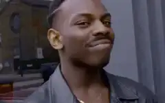 Man smirking with gold earring