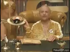Gordon Gekko offers food on a golden platter