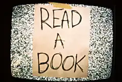 TV static with read a book note