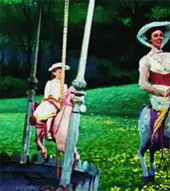 children riding carousel horses