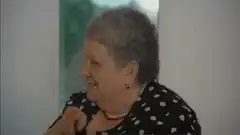Older woman clapping hands