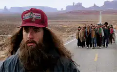 Forrest Gump running with long hair and beard