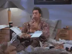 Travis Bickle eating pizza in bed