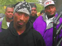 Tupac Shakur looking at the camera