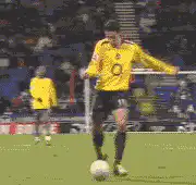 Soccer player misses shot and falls