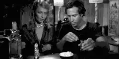 Paul Newman drinks a shot
