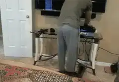 Cat climbs up man's pants