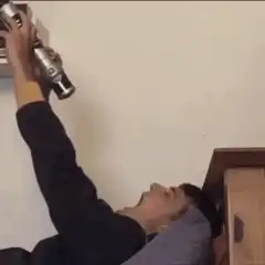 man gets lightsaber in face