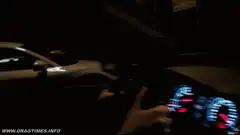 Audi R8 overtaking a Porsche 911 at night