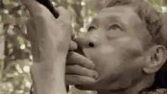Old man watching stock chart go up