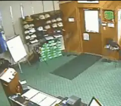 Man falls through ceiling in shop
