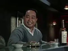 Man slaps forehead then smiles